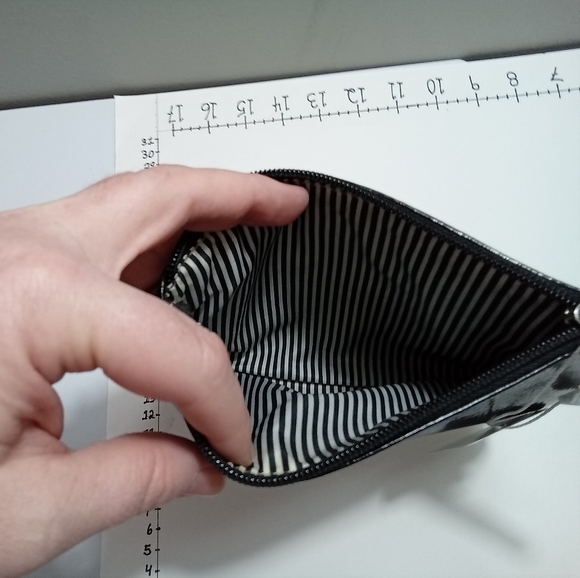 Small black clutch. No tags. Material unknown . Zipper in great condition. - Picture 3 of 3